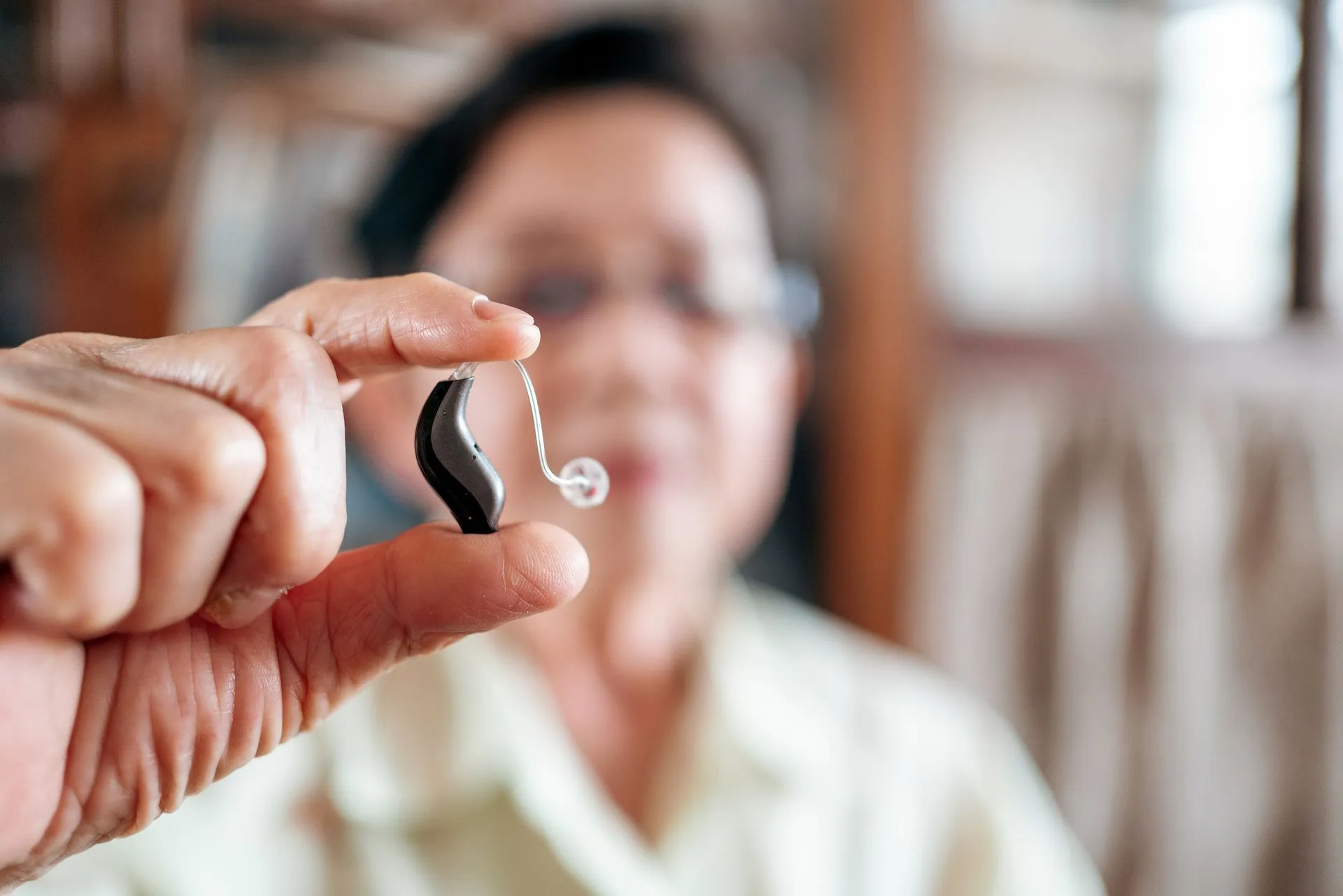 A patient enjoying clear conversation thanks to modern hearing care