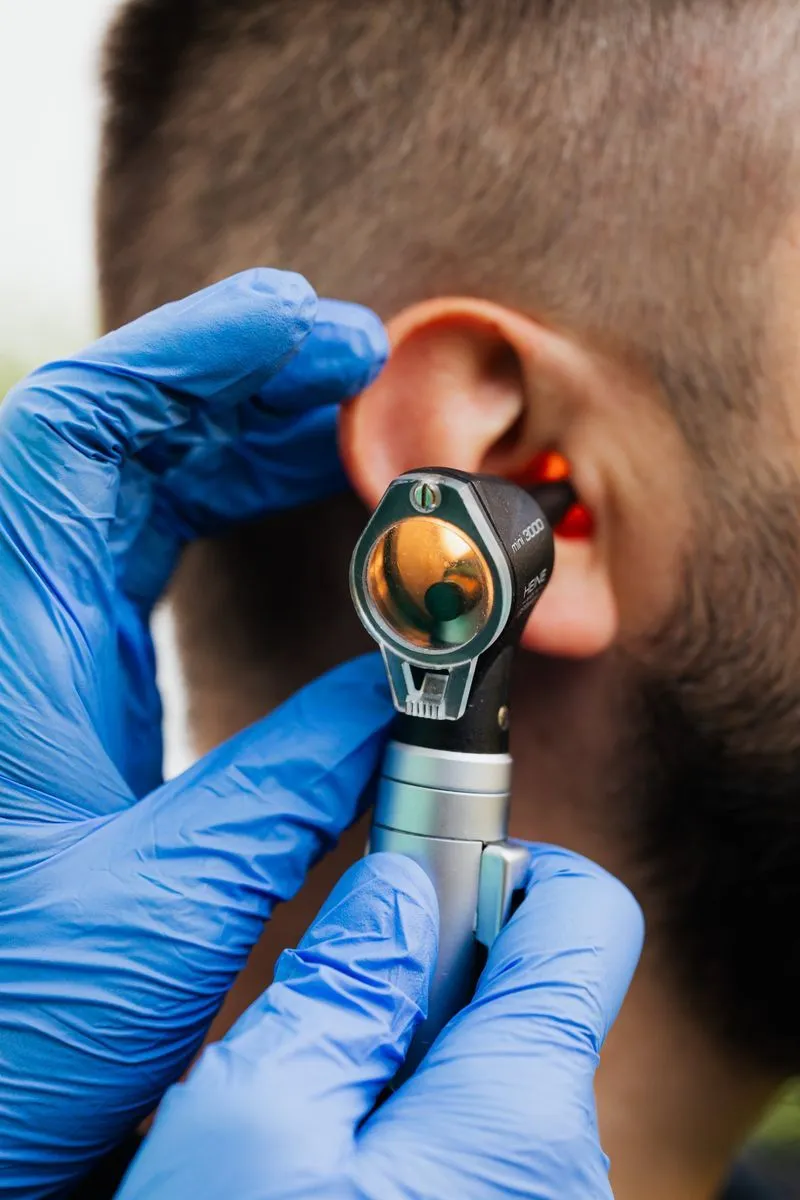 A patient undergoing audiometric hearing testing
